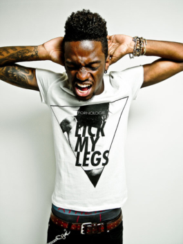 Photography. Fashion editorial. model wear a white printed t-shirt. Lick my legs logo 